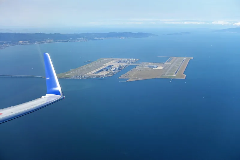 Kansai International Airport in Japan is entirely built on reclaimed land, meaning it was constructed on an artificial island created by filling in a section of Osaka Bay, making it one of the most prominent examples of an airport built on reclaimed land in the world. 